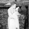 Black and white photo of man and woman embracing