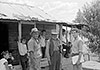 Freedom rider Charles Perkins (right) surveying members of the Moree community about living conditions