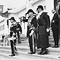 Governor General, Sir Isaac Isaacs, takes the salute on the steps of Parliament House, Canberra, during royal visit of Duke of Gloucester

