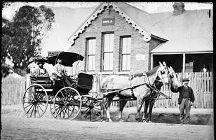 B.O. Holtermann in his carriage and pair outside the girls' section of the Hill End Public School