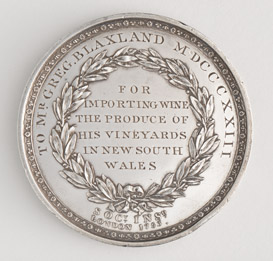 Medal awarded to Gregory Blaxland for wine export from New South Wales, 1823 [reverse]. Silver medal. R 266