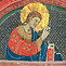 Historiated letter E illustrating Christ blessing the four saints